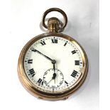 Antique rolled gold open face pocket watch watch is ticking but no warranty given