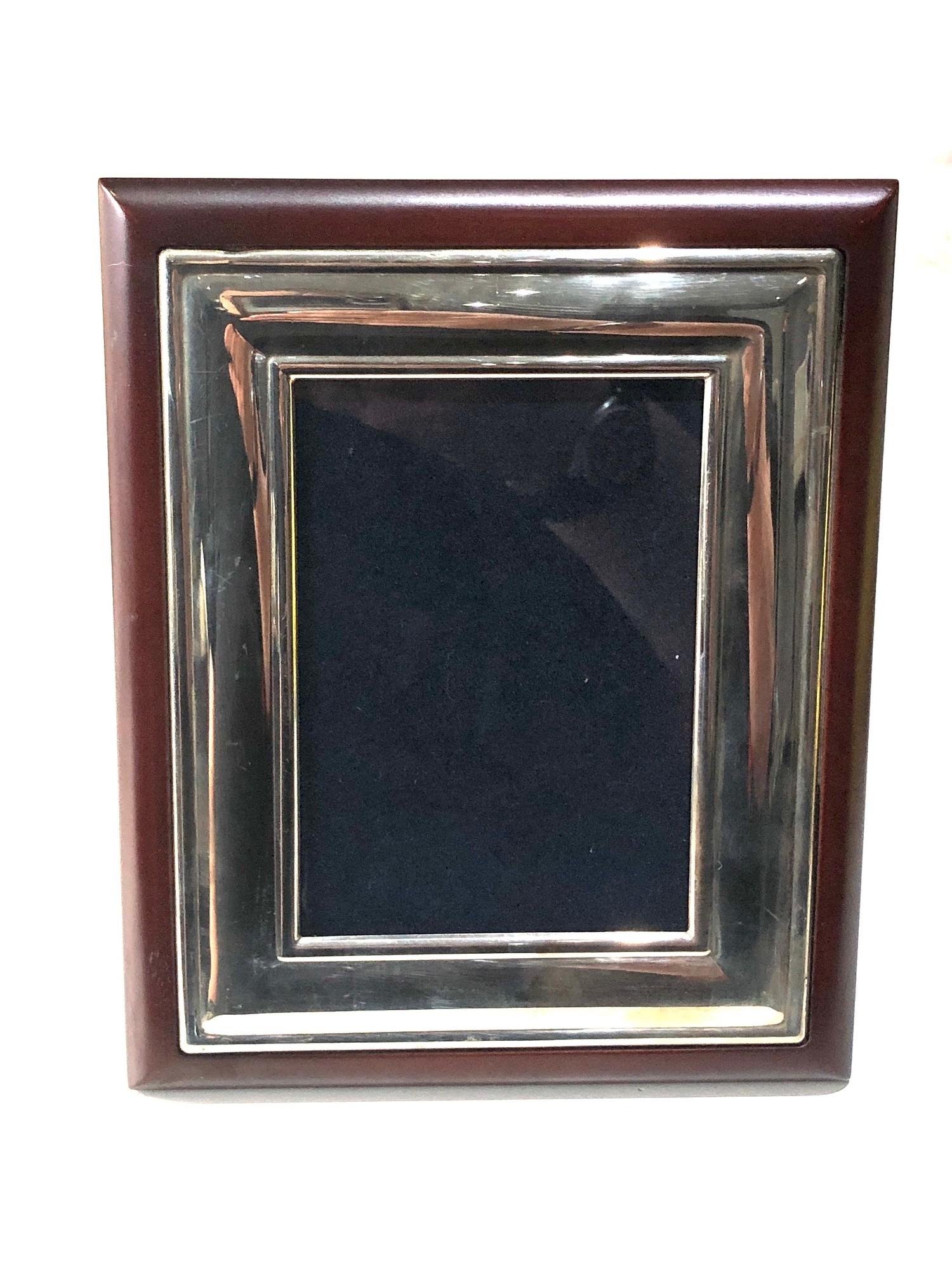 Silver picture picture frame measures approx 20cm by 16.5cm