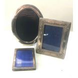 3 silver picture frames largest measures approx 22cm by 17cm