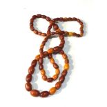 Antique egg yolk amber bead necklace weight 20g