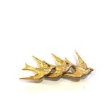 9ct gold antique three swallow bird brooch measures approx 4.2cm by 1.9cm weight 2.1g