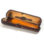 Antique boxed gold rimmed amber cheroot holder measures approx 7.2cm long 1.7cm dia in original box