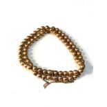 9ct gold ball bead bracelet measures approx 19cm long 1cm wide weight 15g