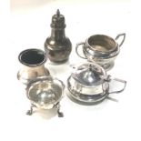 Selection of silver pepper salts and mustard pots missing liners as shown