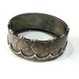 Victorian silver cuff bangle measures approx 2.8cm wide age related marks /dents as shown