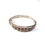 9ct gold almandine garnet bangle w/ Chester hallmark weight 9.1g age related wear marks and creases