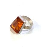 Modernist silver and amber ring