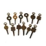 Selection of antique advertising pocket watch keys