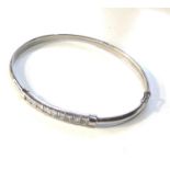 9ct white gold stone set bangle weight 5.2g