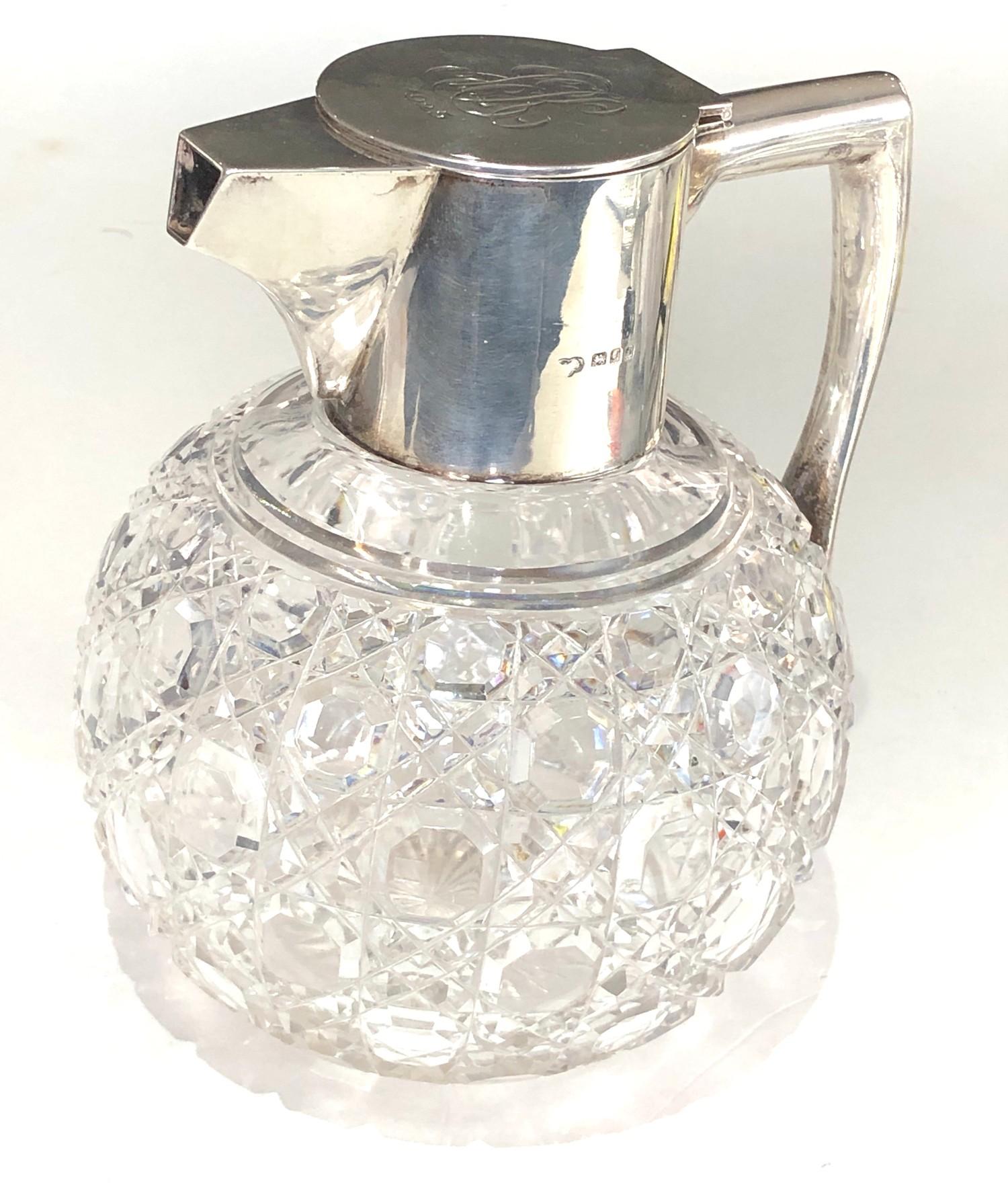 Antique silver and cut glass claret jug London silver hallmarks engraved initials to lid measures