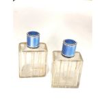 Pair of antique French silver and enamel perfume bottles complete with stoppers in good uncleaned