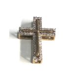 9ct gold diamond cross pendant measures approx 2.1cm by 1.6cm weight 1.7g