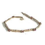 9ct gold garnet set celtic rose design bracelet weight 4.4g measures approx 18.5cm long