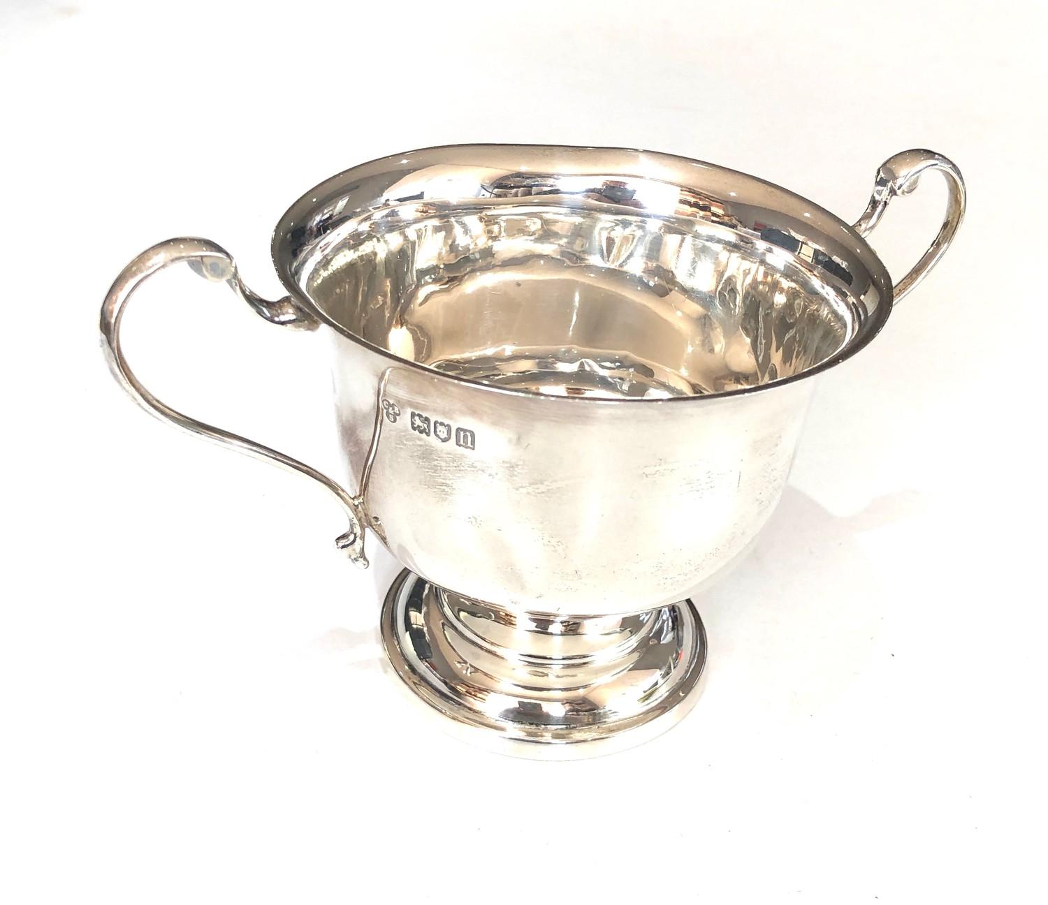 Antique silver 2 handled bowl measures approx 17cm from handles dia 10.5cm height 9cm London