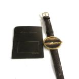 Maurice Guerdat gents 1970s gold tone wristwatch hand winding watch is ticking but no warranty given