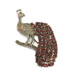 Vintage silver marcasite and garnet stone set pheasant brooch measures approx 7.5cm by 4cm