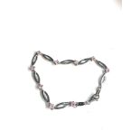 9ct white gold pink stone set bracelet weight 3g