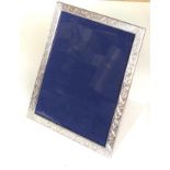 Large silver picture frame measures approx 27cm by 21cm in good overall condition