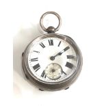 Antique silver open face fusee pocket is ticking but no warranty given
