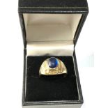 Vintage 9ct Gold stone set Presidents Club Ring central blue stone measures approx 11mm by 7mm age