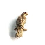 Gold eagle pendant / charm measures approx 2.7cmby 1.1cm weight 7.6g not hallmarked xrt tested as