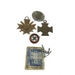 5 ww2 german medals/ badges & miniature book etc