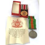 Boxed GV.1 Police medal to henry m thomas + defence medal and award note