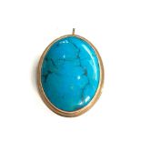 Large 9ct gold framed matrix turquoise brooch / pendant measures approx 6.1cm drop by 3.4cm wide