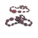 2 Cherry amber / bakelite bead necklace good internal streaking weight 58g