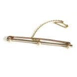 12ct gold antique pearl set bar brooch weight 4.2g xrt tested as 12ct gold