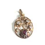 14ct gold garnet & stone set pendant measures approx 3.2cm drop by 2cm wide