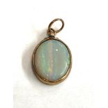 Small 9ct gold opal pendant measures approx 1.8cm drop by 1.2cm wide eight 1.3g