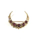 14ct gold garnet crescent brooch measures approx 3cm by 2.5cm hallmarked 14k weight 4.9g