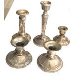 Selection of silver candlesticks weighted bases