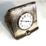 Antique silver case travel clock clock not working winder pulls our engine turned case in good