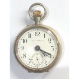 Omega 8 day goliath pocket watch nickel case measures approx 70mm dia in good working condition no