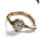 Antique 18ct gold wristwatch and 15ct gold strap total weight 28.5g watch winds and ticks but no