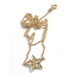 14ct gold diamond set star static pendant necklace weight 2g