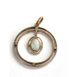 9ct gold opal pendant measures approx 2.6cm dia weight 2.5g