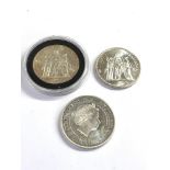 3 silver coins includes 2 10 francs and 1oz elizabeth 1 dollar