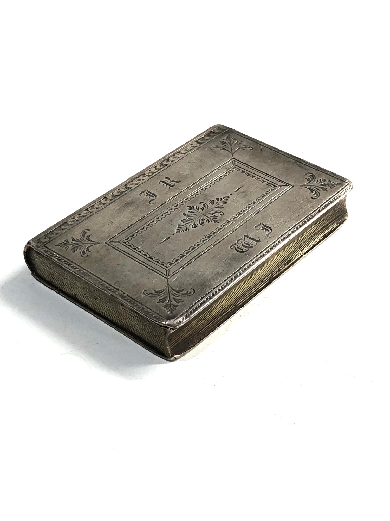 Antique silver book snuff box not hallmarked but xrt as silver measures approx 7.4cm by 5cm