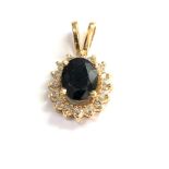 14ct gold sapphire and diamond pendant 0.30ct diamonds measures approx 2.1cm drop by 1.2cm wide