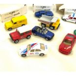 Selection of Corgi and Matchbox cars includes Ford Escort 156, Land rover 90, Dump truck etc