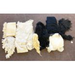 Selection antique lace shawls and table clothes