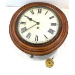 Wall hanging antique station clock, with case key and pendulum, diameter 17 inches
