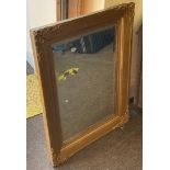 Vintage mirror in heavy gold frame, approximate measurements Height 29.5 inches, Width22 inches