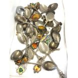 Large selection of souvenir spoons