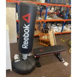Reebok punch bag and a Marcy exercise bench