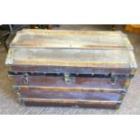Antique travel trunk with large quantity of linen