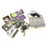 Playstation One with 2 controllers and games, untested